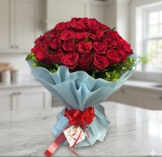 Red Rose Bouquet in Sky Blue Paper Packing with Greens