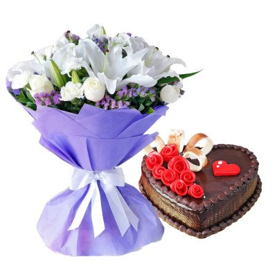 White flowers and heart cake