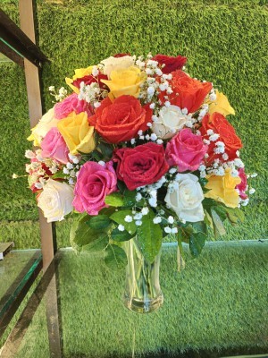 75 mix roses in a glass vase