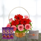 Lovely roses and red gerberas, chocolates with free rakhis