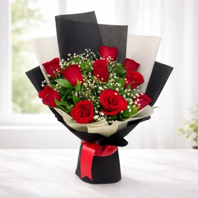 Elegant red roses bouquet with baby’s breath in black and white wrapping paper