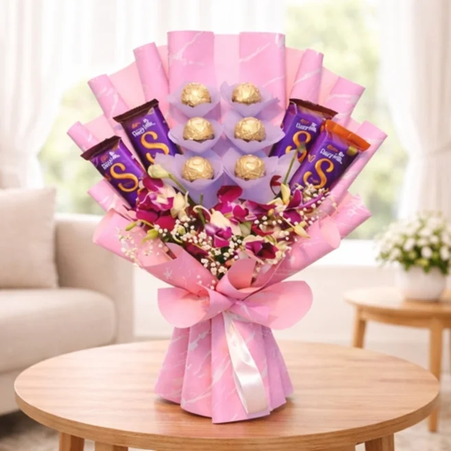 Ferrero Rocher and Dairy Milk Silk chocolate bouquet with orchids in pink wrapping